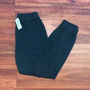 brandy melville hunter green rosa sweatpants
